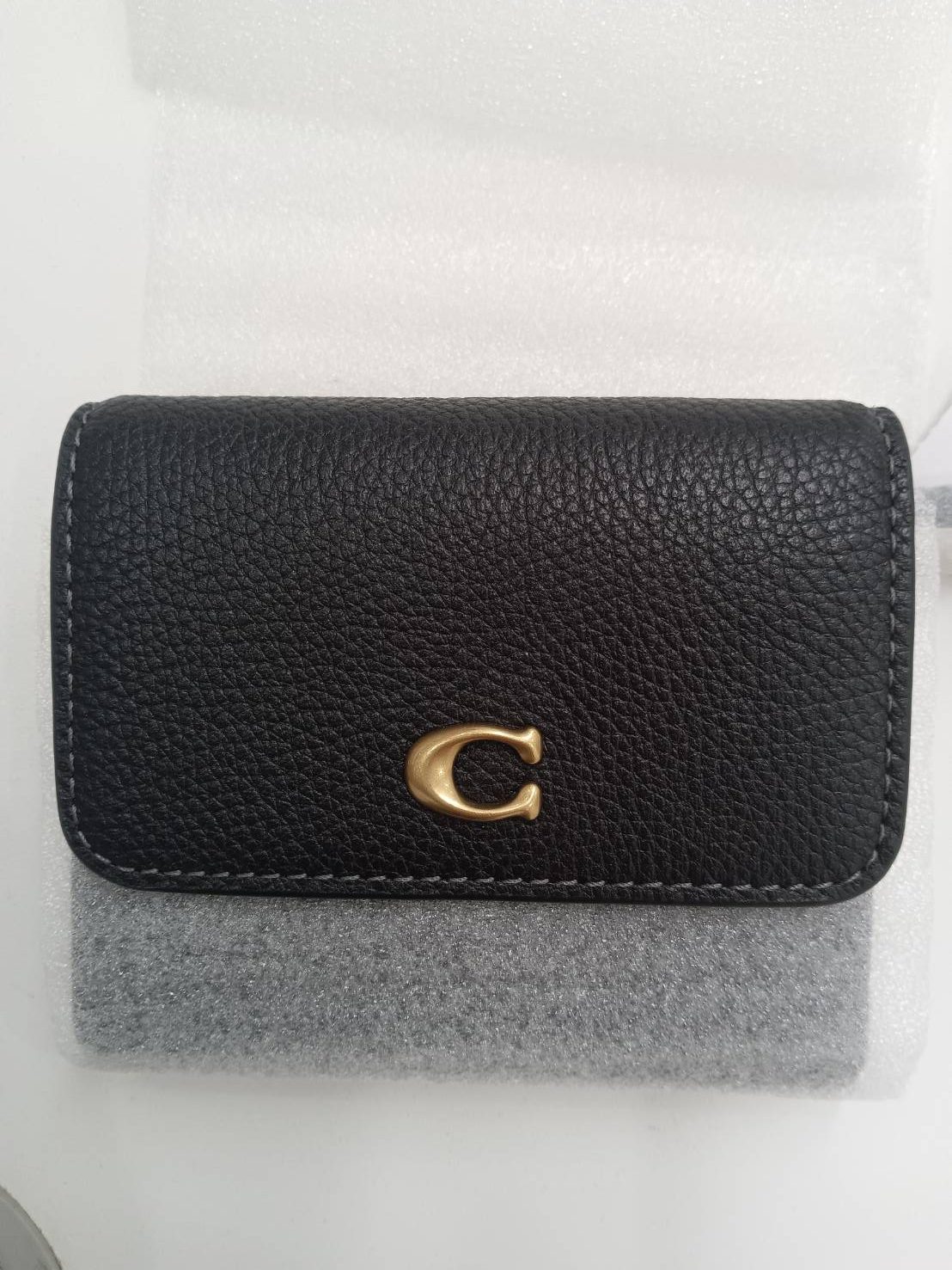 ｺｰﾁ ２つ折り ﾐﾗ ｽﾓｰﾙﾌﾗｯﾌﾟｳｫﾚｯﾄ CAO13